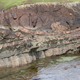 Reddish-colored rocks of the Stac Fada deposit.